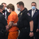 Payton Gendron is escorted away after a hearing at the Erie County Courthouse on May 19, 2022, in Buffalo, New York. Gendron is accused of killing ten people and wounding another three during a shooting at a Tops supermarket on May 14 in Buffalo.